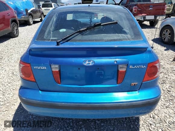2004 Hyundai Elantra GT z VIN KMHDN56D24U104882, wystawiony jako Copart lot #64136915 z przebiegiem 135 495 mil mil oraz Szkoda całkowita • Salvage title. Historia ofert i sprzedaży dostępna na DreamBid. Obrazek 6.
