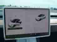 2023 Tesla Model Y Long Range z VIN 7SAYGDEE0PA178495, wystawiony jako IAAI lot #42507571 z przebiegiem 55 840 mil mil oraz . Historia ofert i sprzedaży dostępna na DreamBid. Obrazek 18.