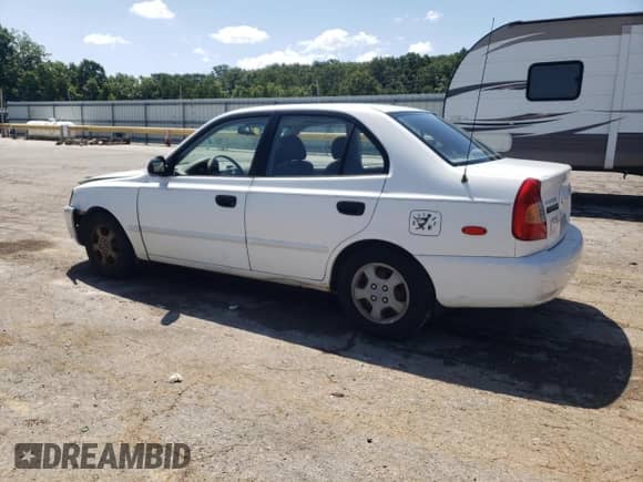 2002 Hyundai Accent GL z VIN KMHCG45C12U343720, wystawiony jako Copart lot #63329455 z przebiegiem 158 251 mil mil oraz Szkoda całkowita • Salvage title. Historia ofert i sprzedaży dostępna na DreamBid. Obrazek 2.