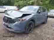 2022 Mazda CX-5 S Preferred z VIN JM3KFBCM3N0643362, wystawiony jako IAAI lot #42644466 z przebiegiem 16 227 mil mil oraz . Historia ofert i sprzedaży dostępna na DreamBid. Obrazek 2.