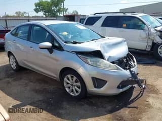 2012 Ford Fiesta SE with VIN 3FADP4BJ9CM196067, listed as a IAAI auction lot 43227887 with 139,354 mi miles and . Bid and sale history available at DreamBid. Image 1.