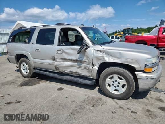 2004 Chevrolet Suburban LS с VIN 3GNFK16ZX4G191385, выставлен на аукционе Copart как лот 68652635 с пробегом 173 434 миль миль и Списание • Salvage title. История ставок и продаж доступна на DreamBid. Изображение 4.