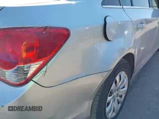 2011 Chevrolet Cruze LS z VIN 1G1PC5SH4B7220105, wystawiony jako IAAI lot #43474662 z przebiegiem 115 046 mil mil oraz . Historia ofert i sprzedaży dostępna na DreamBid. Obrazek 6.