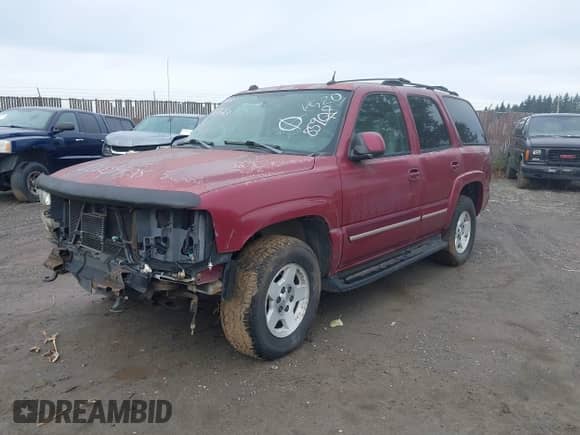 2004 Chevrolet Tahoe LT z VIN 1GNEK13Z94J260999, wystawiony jako IAAI lot #22685908 z przebiegiem 184 790 mil mil oraz . Historia ofert i sprzedaży dostępna na DreamBid. Obrazek 2.