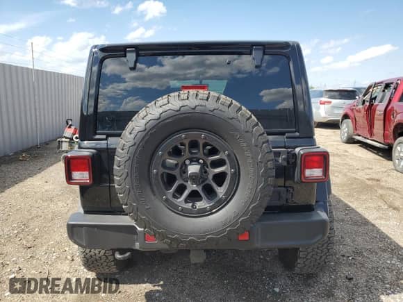2023 Jeep Wrangler Willys with VIN 1C4HJXDG6PW663824, listed as a Copart auction lot 57761905 with 15,040 mi miles and Salvage title. Bid and sale history available at DreamBid. Image 6.