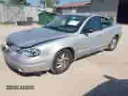 2004 Pontiac Grand Am SE1 with VIN 1G2NF52EX4C200337, listed as a IAAI auction lot 43313819 with Not provided miles and . Bid and sale history available at DreamBid. Image 2.