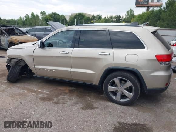 2014 Jeep Grand Cherokee Limited z VIN 1C4RJEBG3EC464031, wystawiony jako IAAI lot #43195288 z przebiegiem 123 706 mil mil oraz . Historia ofert i sprzedaży dostępna na DreamBid. Obrazek 14.