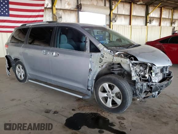 2012 Toyota Sienna LE with VIN 5TDKK3DC8CS195291, listed as a Copart auction lot 67239705 with 70,354 mi miles and Salvage title. Bid and sale history available at DreamBid. Image 4.