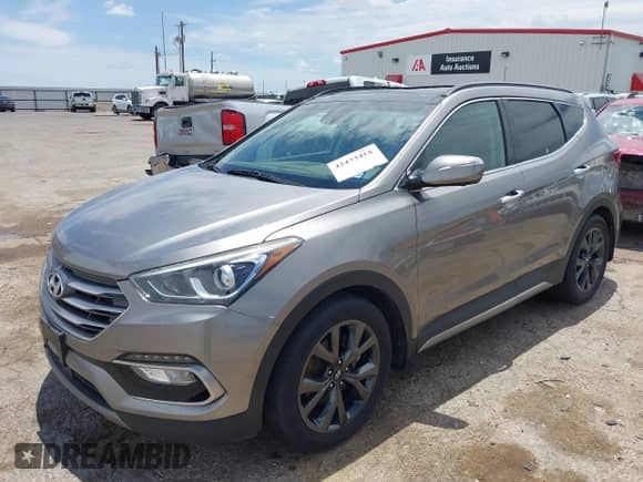 2018 Hyundai Santa Fe Ultimate with VIN 5XYZWDLAXJG531204, listed as a IAAI auction lot 42473418 with 90,726 mi miles and . Bid and sale history available at DreamBid. Image 17.