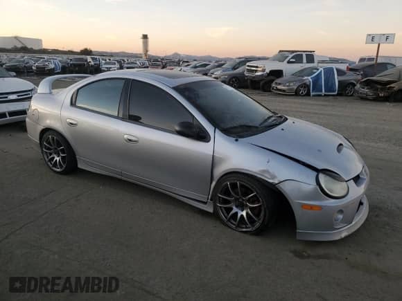 2004 Dodge Neon SRT-4 with VIN 1B3ES66S94D535713, listed as a Copart auction lot 88163355 with 110,202 mi miles and Salvage title. Bid and sale history available at DreamBid. Image 4.