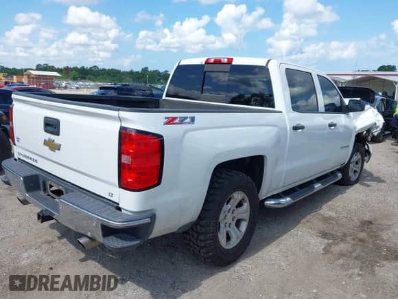 2014 Chevrolet Silverado 1500 LT z VIN 3GCUKREC6EG165041, wystawiony jako IAAI lot #42588499 z przebiegiem 189 554 mil mil oraz . Historia ofert i sprzedaży dostępna na DreamBid. Obrazek 4.