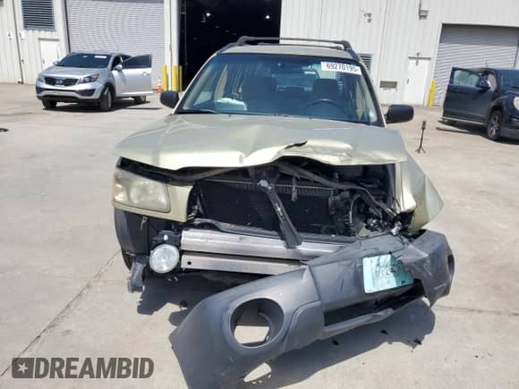 2004 Subaru Forester X with VIN JF1SG63664H728216, listed as a Copart auction lot 69270195 with 188,280 mi miles and Salvage title. Bid and sale history available at DreamBid. Image 5.