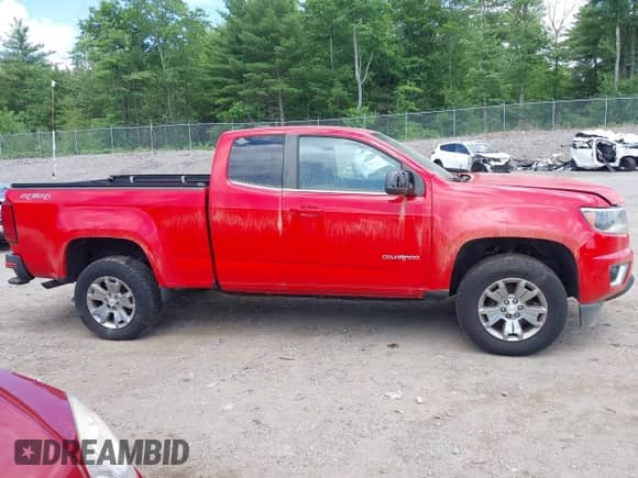 2015 Chevrolet Colorado 4WD LT z VIN 1GCHTBE31F1151831, wystawiony jako IAAI lot #42632869 z przebiegiem 122 770 mil mil oraz . Historia ofert i sprzedaży dostępna na DreamBid. Obrazek 14.