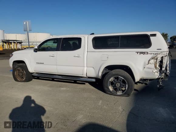 2016 Toyota Tacoma TRD Sport with VIN 3TMBZ5DN9GM001172, listed as a Copart auction lot 86475475 with 92,598 mi miles and Salvage title. Bid and sale history available at DreamBid. Image 2.