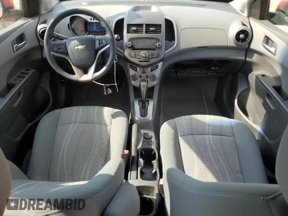 2012 Chevrolet Sonic LT с VIN 1G1JC6SH0C4104155, выставлен на аукционе Copart как лот 80247735 с пробегом 75 444 миль миль и Списание • Salvage title. История ставок и продаж доступна на DreamBid. Изображение 8.