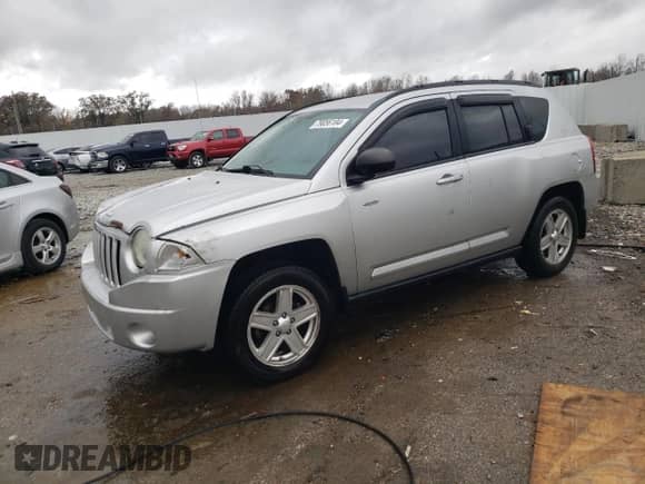 2010 Jeep Compass Latitude с VIN 1J4NF1FB1AD646011, выставлен на аукционе Copart как лот 79056184 с пробегом 178 737 миль миль и На запчасти • Non repairable. История ставок и продаж доступна на DreamBid. Изображение 1.