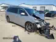 2015 Toyota Sienna SE with VIN 5TDXK3DC0FS567474, listed as a Copart auction lot 80295615 with 93,112 mi miles and Salvage title. Bid and sale history available at DreamBid. Image 4.