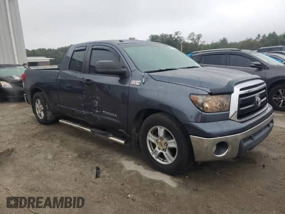 2010 Toyota Tundra с VIN 5TFRY5F16AX086274, выставлен на аукционе Copart как лот 90107315 с пробегом 138 549 миль миль и Списание • Salvage title. История ставок и продаж доступна на DreamBid. Изображение 4.