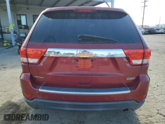 2013 Jeep Grand Cherokee Limited с VIN 1C4RJEBG5DC656954, выставлен на аукционе Copart как лот 82373845 с пробегом 148 213 миль миль и Списание • Salvage title. История ставок и продаж доступна на DreamBid. Изображение 6.