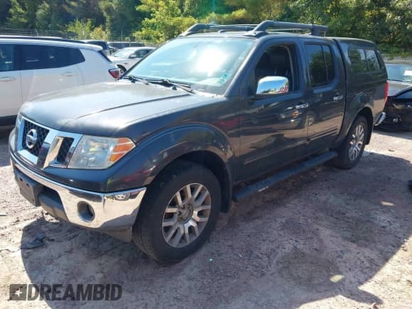2010 Nissan Frontier LE with VIN 1N6AD0EV3AC415758, listed as a IAAI auction lot 43178391 with 162,783 mi miles and . Bid and sale history available at DreamBid. Image 2.