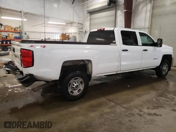 2015 Chevrolet Silverado 2500HD Work Truck z VIN 1GC1KUEG7FF649263, wystawiony jako Copart lot #44401835 z przebiegiem 184 654 mil mil oraz Szkoda całkowita • Salvage title. Historia ofert i sprzedaży dostępna na DreamBid. Obrazek 3.