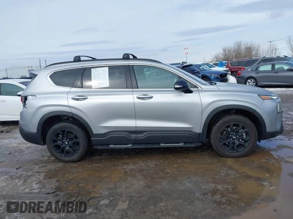 2022 Hyundai Santa Fe XRT с VIN 5NMS6DAJ7NH388776, выставлен на аукционе IAAI как лот 41614829 с пробегом 50 529 миль миль и . История ставок и продаж доступна на DreamBid. Изображение 13.