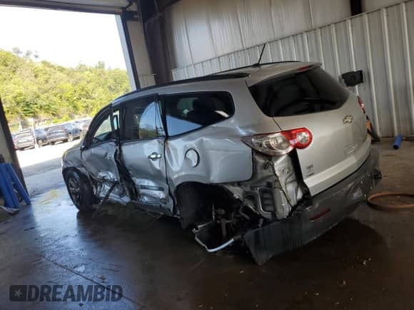 2010 Chevrolet Traverse LS z VIN 1GNLVEED6AJ236050, wystawiony jako Copart lot #67088695 z przebiegiem Nie podano mil oraz Szkoda całkowita • Salvage title. Historia ofert i sprzedaży dostępna na DreamBid. Obrazek 2.