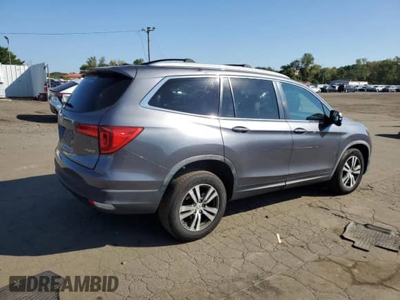 2016 Honda Pilot EX with VIN 5FNYF6H39GB023260, listed as a Copart auction lot 80219965 with 121,281 mi miles and Salvage title. Bid and sale history available at DreamBid. Image 3.
