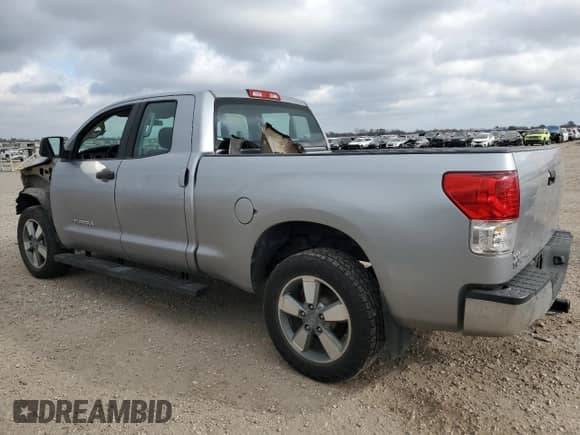 2012 Toyota Tundra z VIN 5TFRU5F13CX027956, wystawiony jako Copart lot #43580265 z przebiegiem 156 862 mil mil oraz Szkoda całkowita • Salvage title. Historia ofert i sprzedaży dostępna na DreamBid. Obrazek 2.
