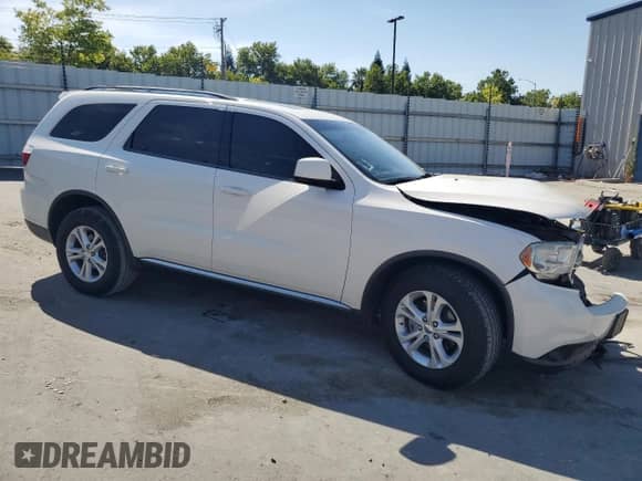 2012 Dodge Durango SXT с VIN 1C4RDJAG3CC286197, выставлен на аукционе Copart как лот 60494825 с пробегом 140 660 миль миль и Списание • Salvage title. История ставок и продаж доступна на DreamBid. Изображение 4.