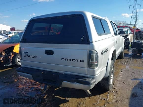 2004 Dodge Dakota Sport with VIN 1D7HG38K44S591424, listed as a IAAI auction lot 41645873 with 135,396 mi miles and . Bid and sale history available at DreamBid. Image 4.