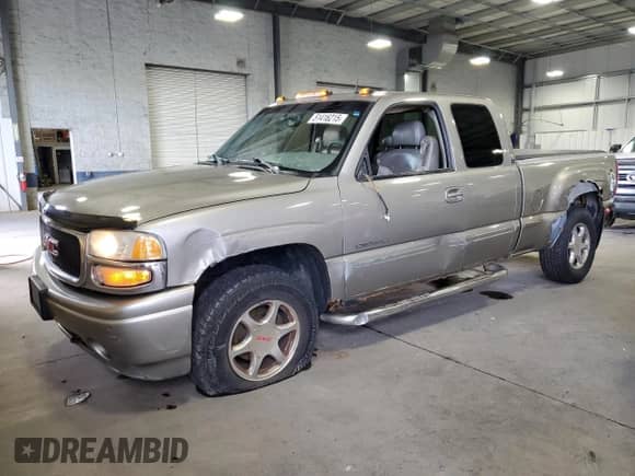 2002 GMC Sierra 1500 Denali z VIN 2GTFK69U021173036, wystawiony jako Copart lot #51416215 z przebiegiem 316 034 mil mil oraz Szkoda całkowita • Salvage title. Historia ofert i sprzedaży dostępna na DreamBid. Obrazek 1.