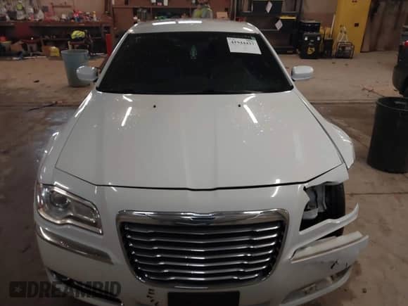 2013 Chrysler 300 with VIN 2C3CCARG6DH505220, listed as a IAAI auction lot 41944437 with 196,548 mi miles and . Bid and sale history available at DreamBid. Image 12.