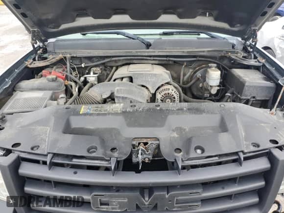 2011 GMC Sierra 1500 Work Truck z VIN 1GTN2TE0XBZ105489, wystawiony jako Copart lot #60277115 z przebiegiem 158 408 mil mil oraz Szkoda całkowita • Salvage title. Historia ofert i sprzedaży dostępna na DreamBid. Obrazek 11.