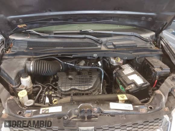 2014 Dodge Grand Caravan SE with VIN 2C4RDGBG7ER190715, listed as a IAAI auction lot 43437741 with 97,908 mi miles and . Bid and sale history available at DreamBid. Image 10.