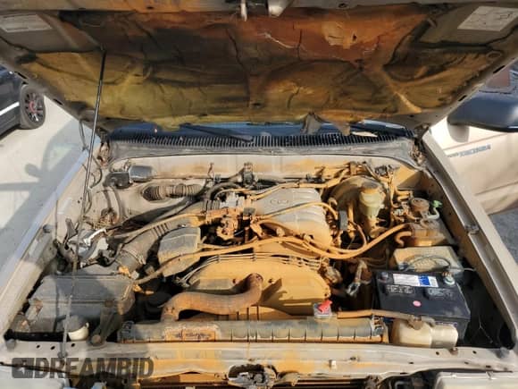 2000 Toyota Tacoma PreRunner z VIN 4TASN92N8YZ657400, wystawiony jako Copart lot #82271215 z przebiegiem 165 953 mil mil oraz Czysty tytuł • Clean title. Historia ofert i sprzedaży dostępna na DreamBid. Obrazek 11.