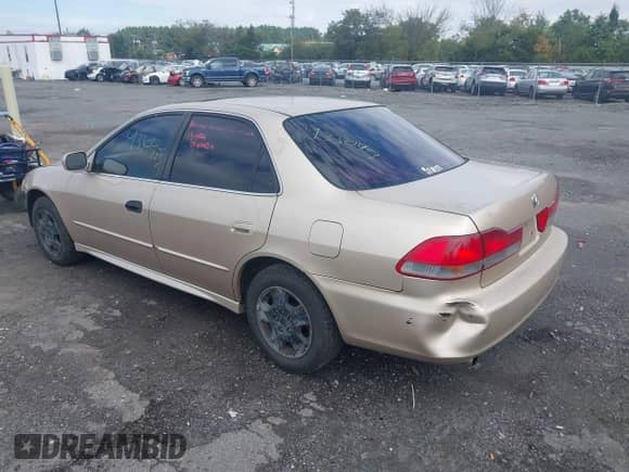 2002 Honda Accord EX with VIN 1HGCG16552A054717, listed as a IAAI auction lot 43300453 with 208,960 mi miles and . Bid and sale history available at DreamBid. Image 3.