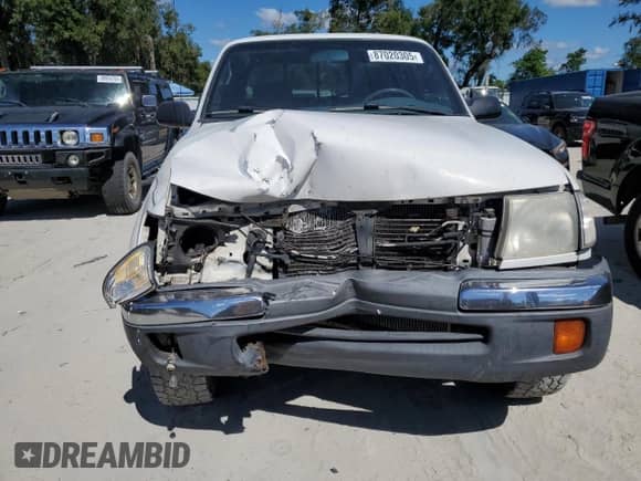2000 Toyota Tacoma PreRunner with VIN 5TESM92N6YZ695316, listed as a Copart auction lot 87020305 with 296,491 mi miles and Salvage title. Bid and sale history available at DreamBid. Image 5.