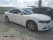 2015 Dodge Charger SE with VIN 2C3CDXBG0FH799419, listed as a Copart auction lot 84009815 with 180,797 mi miles and Salvage title. Bid and sale history available at DreamBid. Image 4.