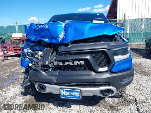 2022 Ram 1500 Rebel z VIN 1C6SRFLT0NN177124, wystawiony jako IAAI lot #41575076 z przebiegiem 40 065 mil mil oraz . Historia ofert i sprzedaży dostępna na DreamBid. Obrazek 12.