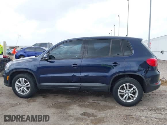 2013 Volkswagen Tiguan SE z VIN WVGAV3AX9DW613283, wystawiony jako IAAI lot #41954359 z przebiegiem 147 525 mil mil oraz . Historia ofert i sprzedaży dostępna na DreamBid. Obrazek 14.