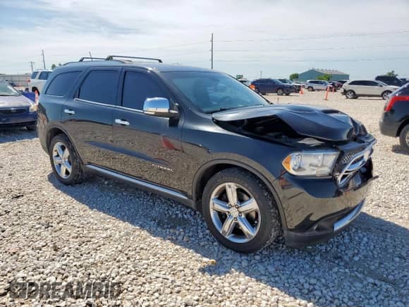 2011 Dodge Durango Citadel with VIN 1D4SD5GT7BC613523, listed as a Copart auction lot 57176925 with 174,702 mi miles and Salvage title. Bid and sale history available at DreamBid. Image 4.