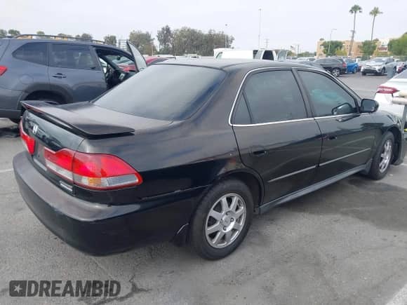 2002 Honda Accord SE with VIN JHMCG66802C008396, listed as a IAAI auction lot 42850312 with Not provided miles and . Bid and sale history available at DreamBid. Image 4.