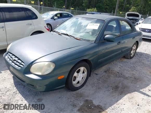 1999 Hyundai Sonata GLS with VIN KMHWF35V6XA107973, listed as a IAAI auction lot 42119318 with 174,231 mi miles and . Bid and sale history available at DreamBid. Image 2.