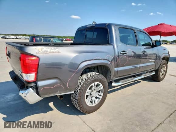 2016 Toyota Tacoma TRD Off Road с VIN 3TMAZ5CN8GM006585, выставлен на аукционе Copart как лот 70260245 с пробегом 94 079 миль миль и Списание • Salvage title. История ставок и продаж доступна на DreamBid. Изображение 3.