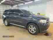2013 Dodge Durango Crew with VIN 1C4RDJDG9DC682700, listed as a Copart auction lot 68078015 with 169,828 mi miles and Salvage title. Bid and sale history available at DreamBid. Image 4.