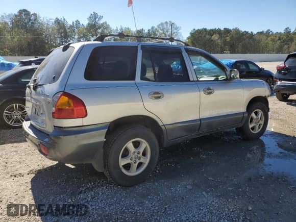2002 Hyundai Santa Fe GLS z VIN KM8SC13D22U233146, wystawiony jako Copart lot #80273844 z przebiegiem 213 822 mil mil oraz Szkoda całkowita • Salvage title. Historia ofert i sprzedaży dostępna na DreamBid. Obrazek 3.