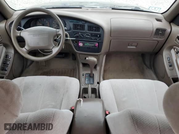 1996 Toyota Camry DX с VIN 4T1BG12K1TU911181, выставлен на аукционе Copart как лот 90502495 с пробегом 302 458 миль миль и Чистый • Clean title. История ставок и продаж доступна на DreamBid. Изображение 8.