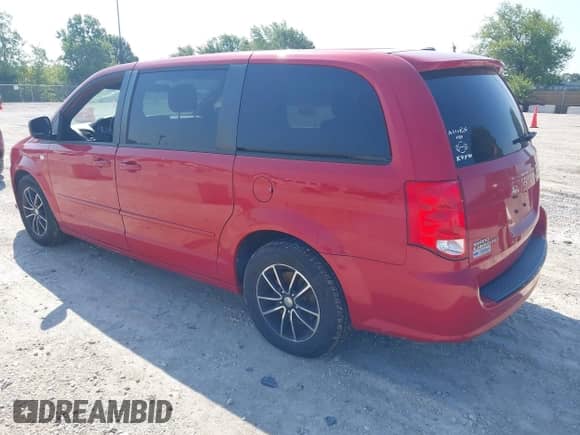 2014 Dodge Grand Caravan SE with VIN 2C4RDGBG1ER411290, listed as a IAAI auction lot 42937086 with 195,751 mi miles and . Bid and sale history available at DreamBid. Image 3.