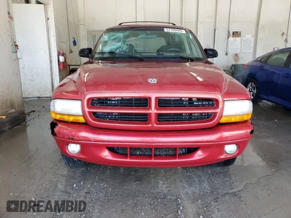 1998 Dodge Durango with VIN 1B4HS28Y5WF100889, listed as a Copart auction lot 57709425 with 261,895 mi miles and Salvage title. Bid and sale history available at DreamBid. Image 5.